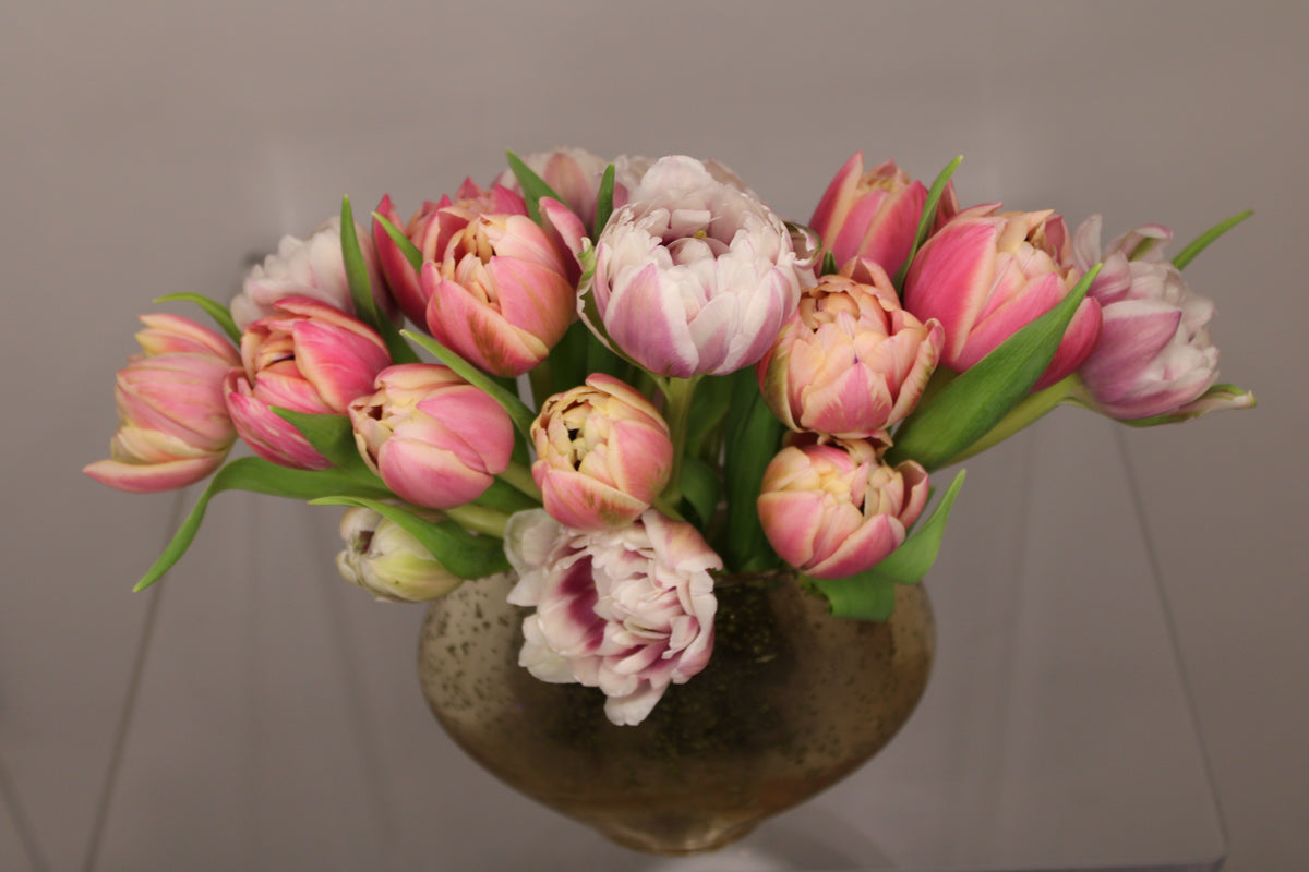 artsy gold deco vase with multicolored double peony tulips - lavender and white; coral and yellow; green